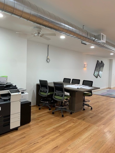 Desk, chairs, and printers at the finished Citadel Workspace
