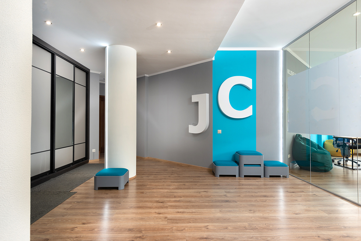 A pop of bright blue paint in the entrance of an office lobby